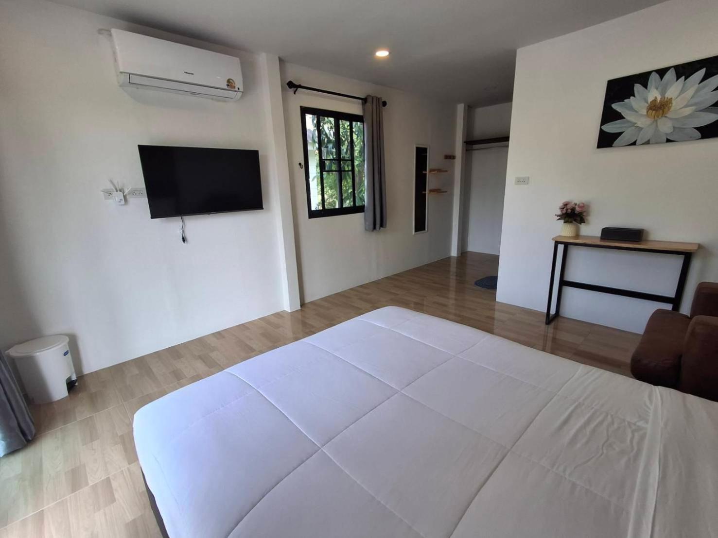 Ferienwohnung Homlomchomsuan หอมลมชมสวน Ban Mai  Zimmer foto
